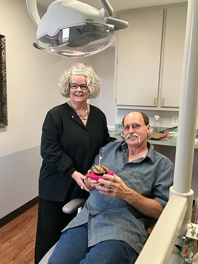 man smiling during his visit to DentaCare Dental Group Longview