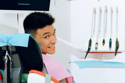 man smiling during his preventive dentistry appointment
